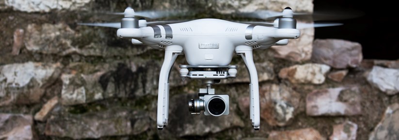 How have drones impacted building surveying?